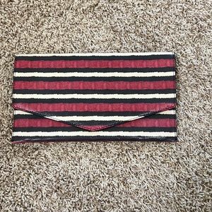 Cole Haan lizard print clutch